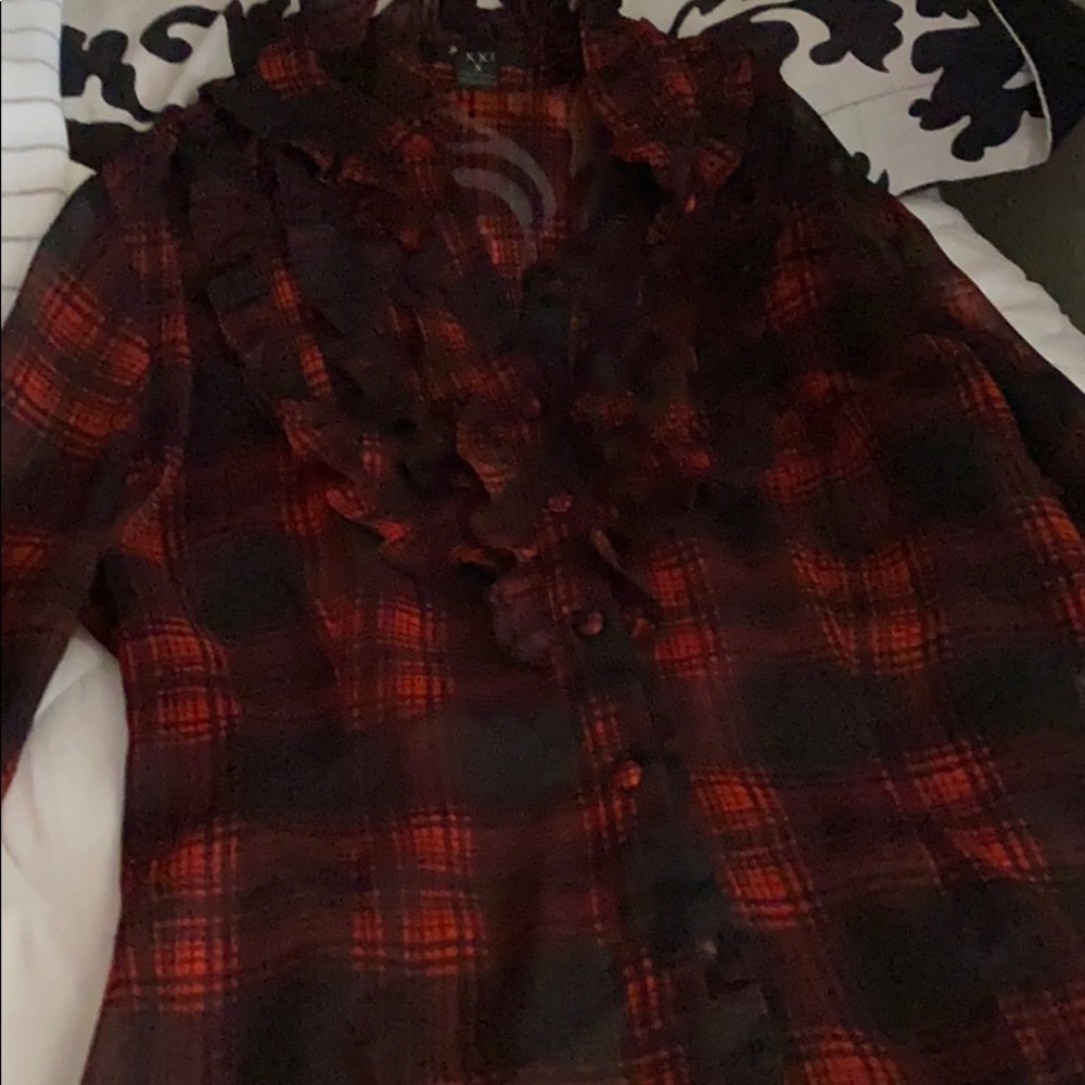 A black and red silky long sleeve shirt